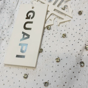 GUAPI WHITE EMBELLISHED STACKED DENIM