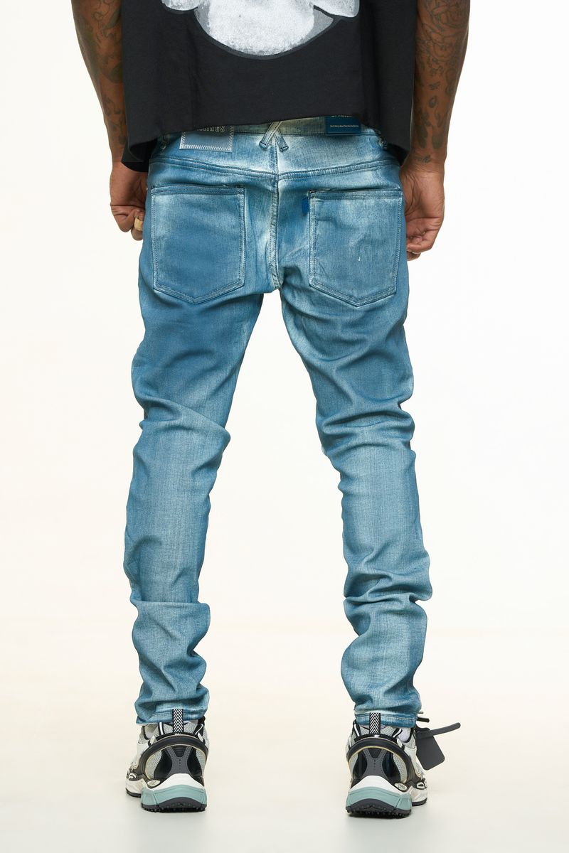 "WASHED AWAY" SKINNY DENIM