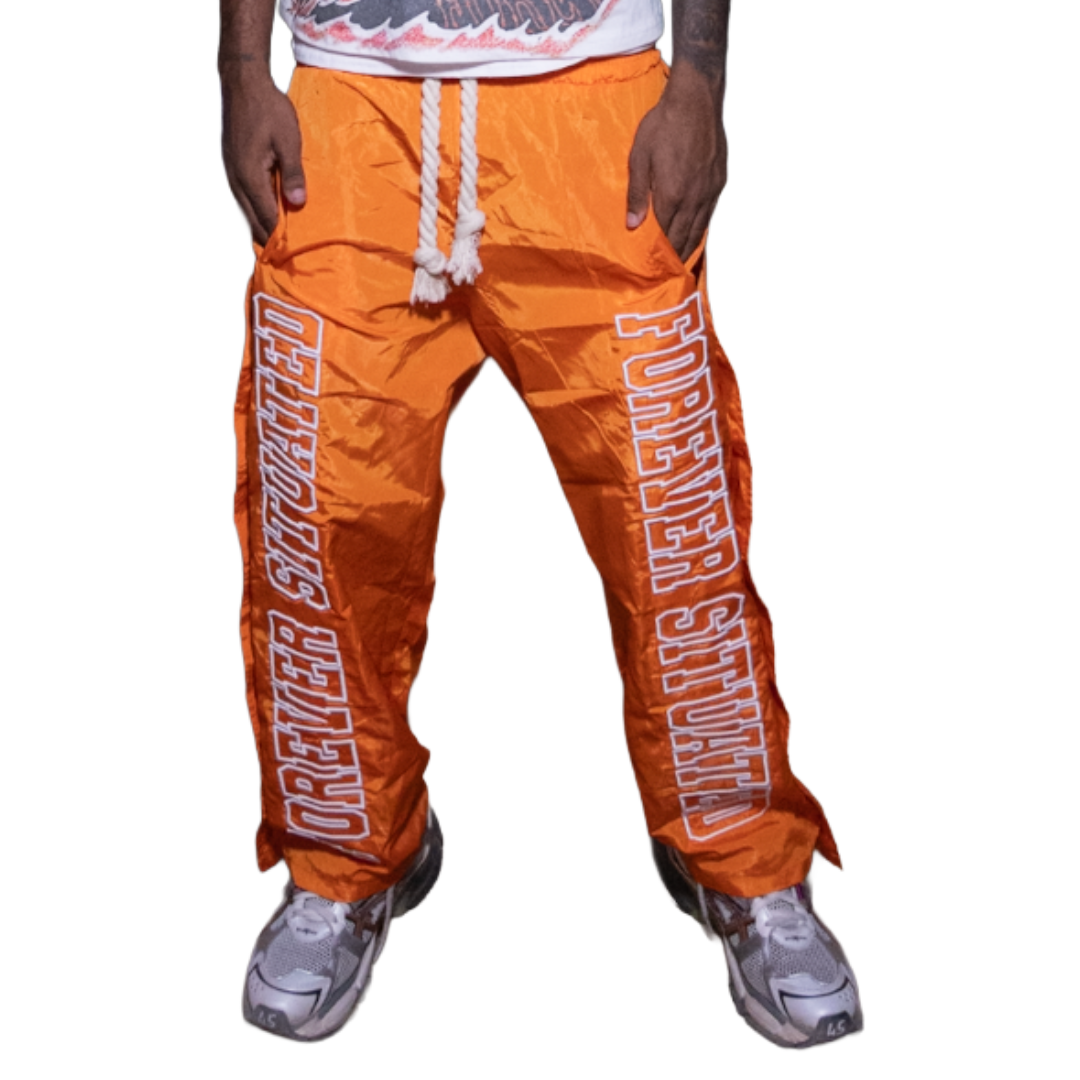 FS ORANGE NYLON TRACK PANTS